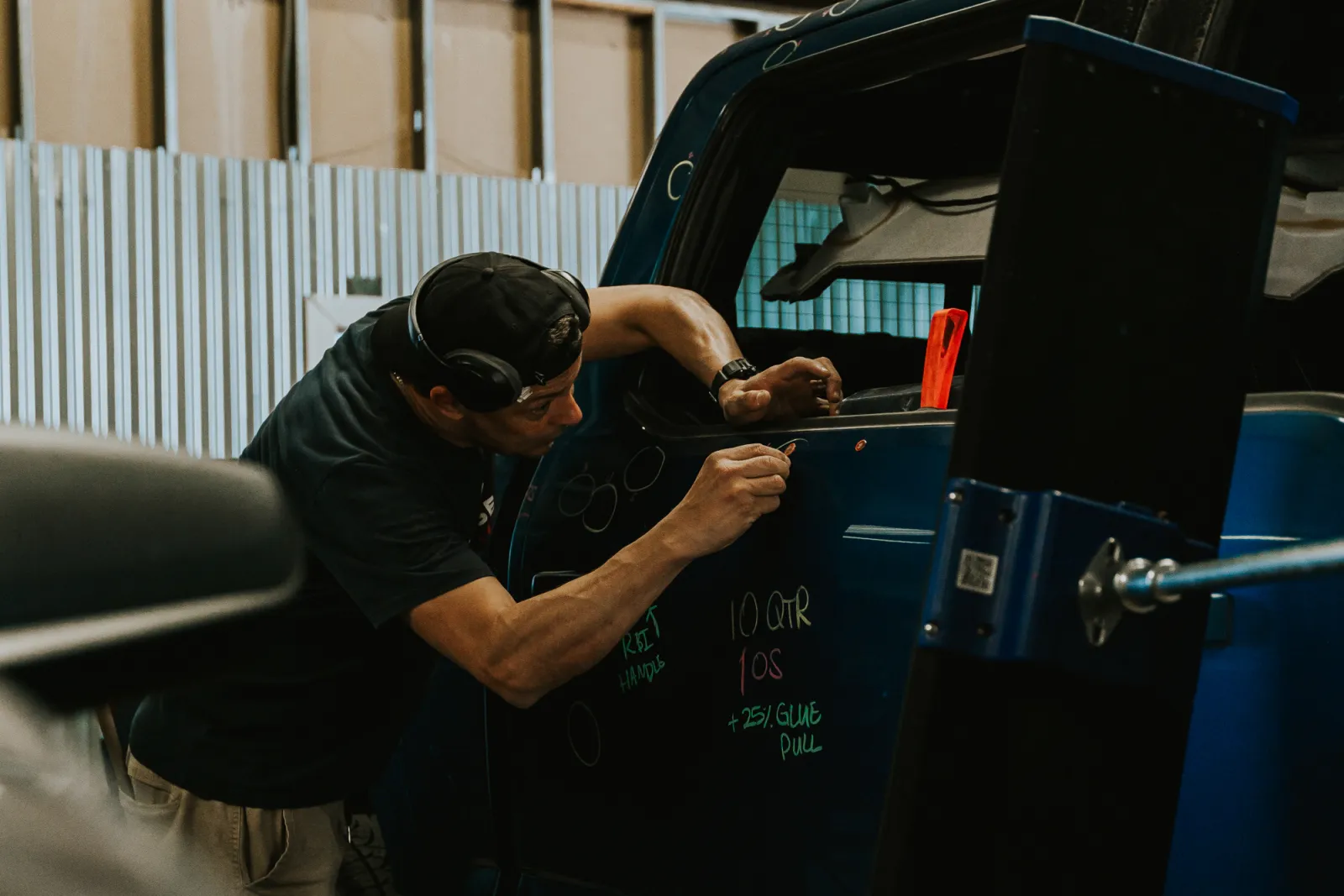 Truck door dent marking for a Big Spring TX hail repair estimate